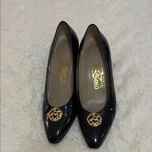 Salvatore Ferragamo Black Heels with Gold Emblem